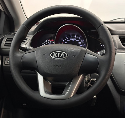 Kia Rio 1.4 MT (107 л.с.) 2012
